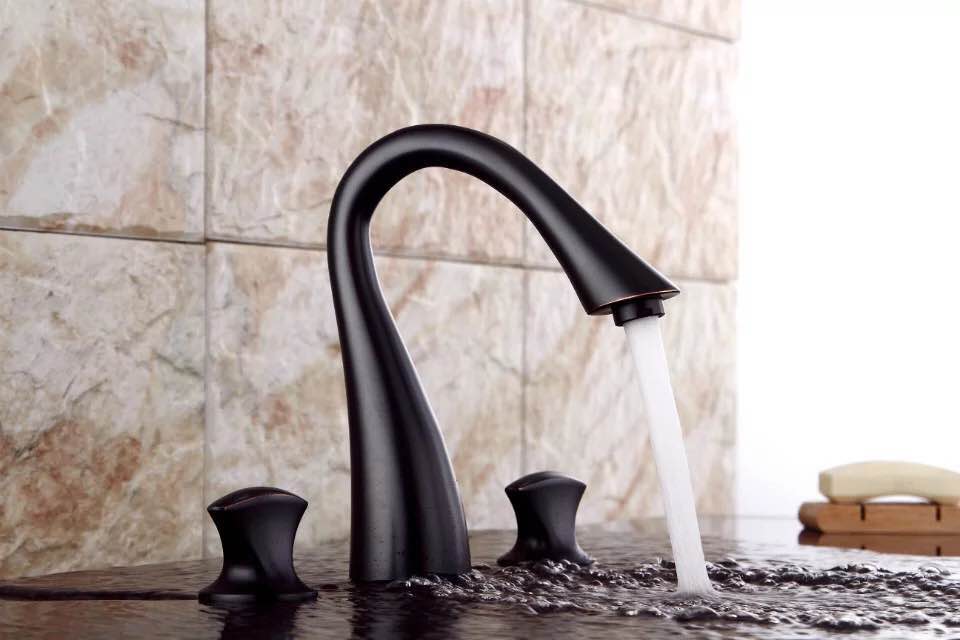 black bathroom sink taps